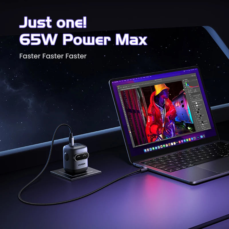 Compact UGREEN GaN fast charger with up to 100W 65W 30W power, designed for phones, tablets, and laptops.