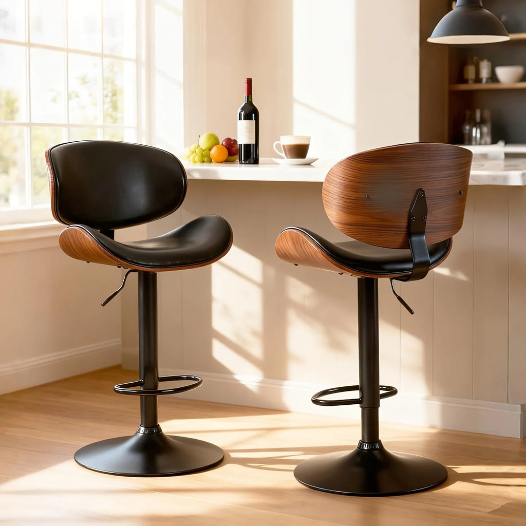 Modern Adjustable Ergonomic Bar Stool Set
Dine and drink in total comfort. These sleek PU leather bar stools feature an adjustable gas lift, ergonomic backrest, and footrest. Available in sets of 2 or 4 to perfectly fit your space.